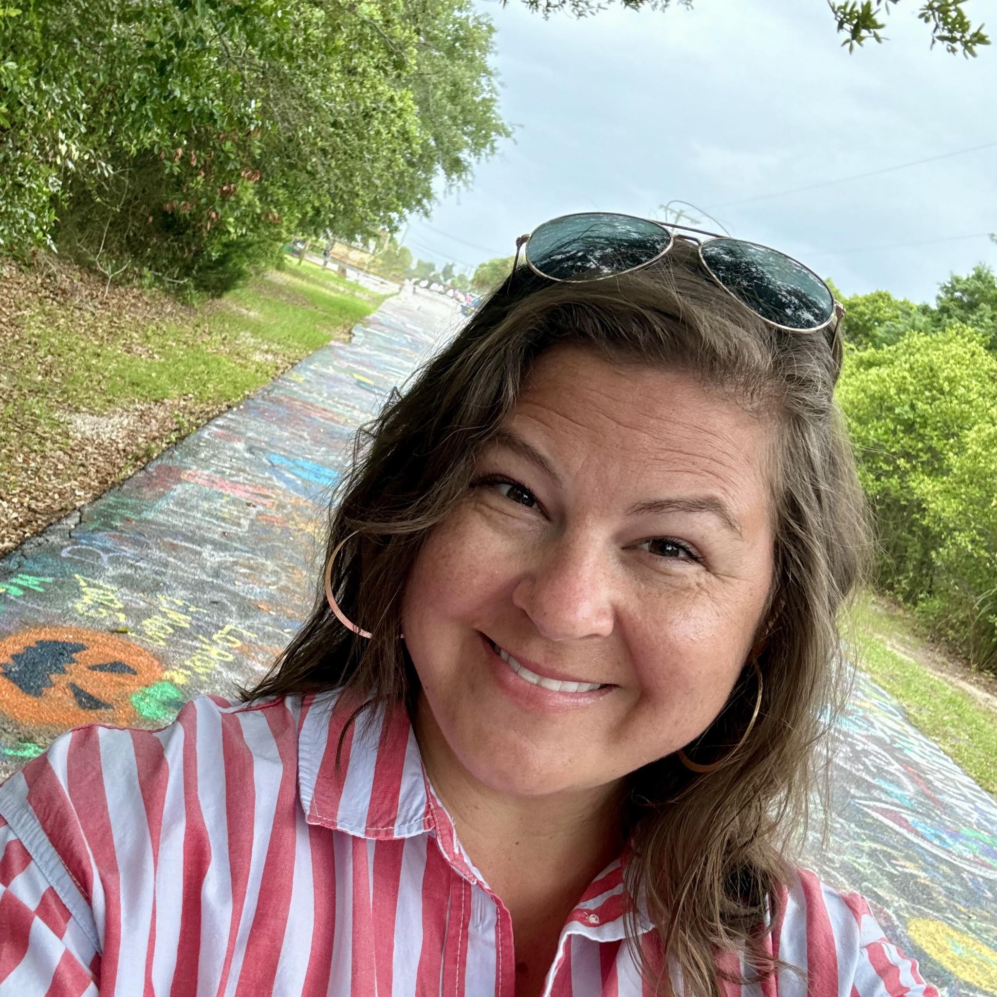 Christin Marie, smiling outdoors